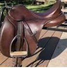 Stirrups & leathers must be fitted to the outside saddle flap
